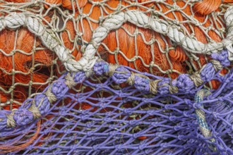 Fishing nets in purple and orange, Greetsiel, East Frisia, Lower Saxony, Germany