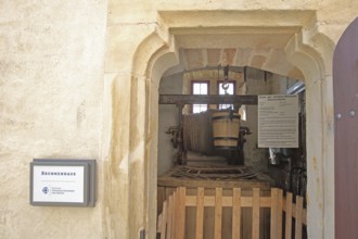 Well house with winch and water bucket, water bucket, rope, winch, pulley, pulley block, pulley,