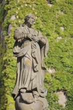 Madonna figure with halo, sculpture, statue, market square, Saal an der Saale, Lower Franconia,
