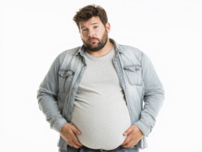 Overweight young man looks worried and holds his hands to his stomach, AI generated, AI generated