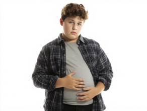 Overweight teenager looks worried and holds his hands on his stomach, AI generated, AI generated