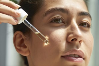 Close up of woman applying face serum with glass dropper. . Generative ia, AI generated