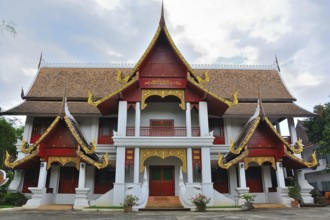 Traditional thai temple showcasing intricate details, vibrant colors, and unique architectural