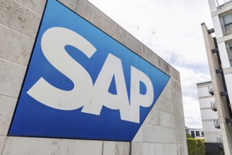 Logo and building of the software company SAP SE. Walldorf, Baden-Württemberg, Germany