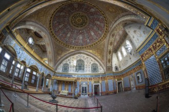 Wide angle view of the richly decorated interior of topkapi palace, showcasing intricate ottoman