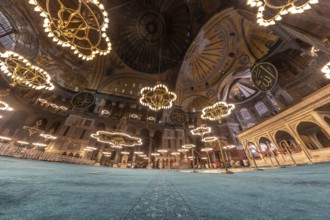 Wide angle view of the interior of hagia sophia in istanbul, turkey, showcasing its magnificent