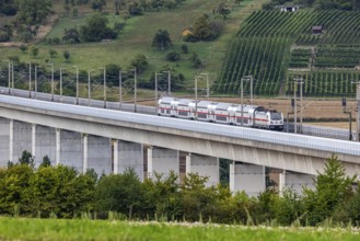 Enztal bridge with InterCity. Double-track railway overpass of the high-speed line from Mannheim to