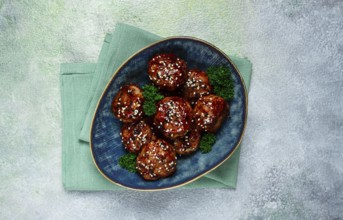 Tsukune, Japanese meatballs, minced chicken, fried on a skewer, with yakitori sauce, homemade, no