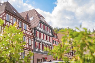 Half-timbered houses with colourful shutters in a historic old town, small town of Perle Calw,