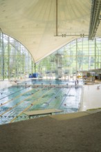 Spacious indoor swimming pool with large window fronts that let in plenty of light, Olympiapark,