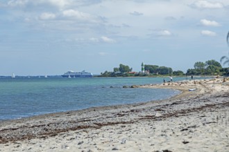 Beach, lighthouse Bülk, Color Line ship, sailing boats, Strande, Schleswig-Holstein, Germany