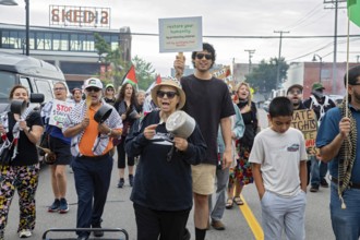 Detroit, Michigan USA - 23 August 2025 - Protesters rally at Eastern Market, banging empty pots to