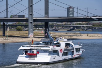 Rhine excursion boat, Rhine Poetry of the KD on the Rhine near Düsseldorf, Rheinkniebrücke, behind