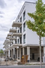 Shell construction, shortly in front of completion of a residential building, new Graf Bismarck
