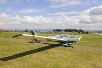 Motor glider of type Scheibe SF.25C Falke is parked at Wasserkuppe airfield, Wasserkuppe airfield,