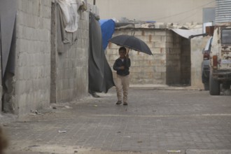 Syrian children playing in a refugee camp near the Turkish border on World Children's Day. Aleppo,