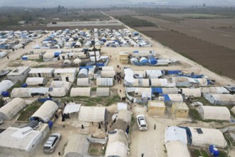 Aerial photo showing dozens of makeshift tents housing Syrian refugees near the Turkish border