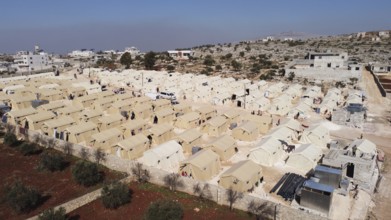 Aerial photo showing dozens of makeshift tents housing Syrian refugees near the Turkish border
