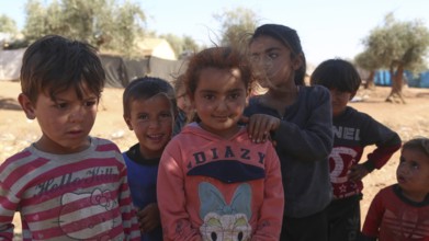 A group of Syrian refugee children gathered inside a camp. Aleppo, Syria. October 29, 2022, Aleppo,