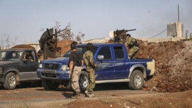 Vehicles and heavy weapons used by Syrian opposition fighters in combat against ISIS. Aleppo, Syria