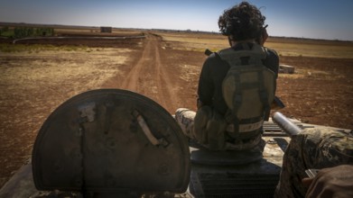 Vehicles and heavy weapons used by Syrian opposition fighters in combat against ISIS. Aleppo, Syria