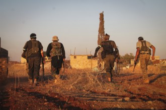 Vehicles and heavy weapons used by Syrian opposition fighters in combat against ISIS. Aleppo, Syria