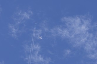 Two airliners Airbus A380 jet passenger aircraft of Emirates airlines and a Boeing 737 of Norweign