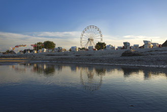 Ferris wheel and beach chairs on the beach at Dahme, Bay of Lübeck, Baltic Sea, Schleswig-Holstein