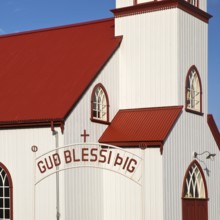 Church in Vopnafjördur with lettering on the entrance gate, East Iceland, Iceland