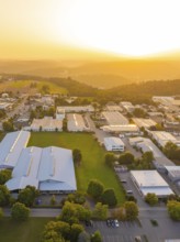 Industrial area with many buildings in a picturesque landscape at sunset, industrial area Wolfsberg