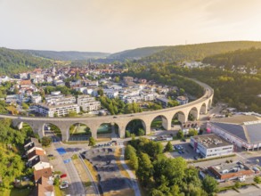 Large viaduct in a town, framed by hills and evening atmosphere, Nagold, district of Calw, Black