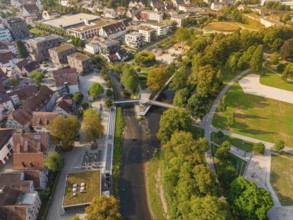 Aerial view of a park with river and bridges, surrounded by a town, Nagold, district of Calw, Black
