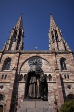 Monument, statue of Charles Emile Freppel, theologian and Bishop of Angers, in front of the church