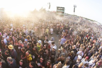 Festival visitors during a mosh pit at the Highfield Festival on Saturday, Störmthaler See,