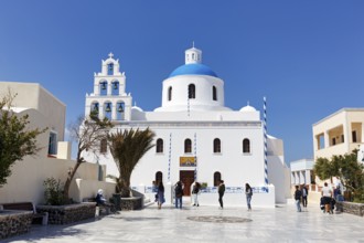 Orthodox church Panagia Platsani, whitewashed, typical blue dome, pyramid-shaped bell tower with