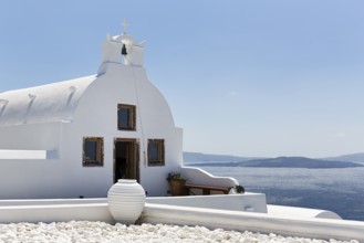 White architecture, orthodox church by the sea, Oia, Santorini, Cyclades, Aegean Sea, Greece
