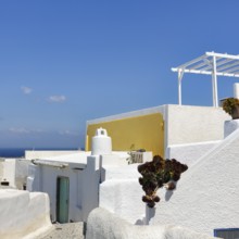 Architectural detail, typical white holiday homes, blue sky, Oia, Thira, Santorini, Cyclades,