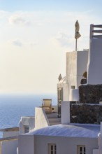 Sun lounger on terrace, holiday home with sea view, evening light, Oia, Thira, Santorini, Cyclades,