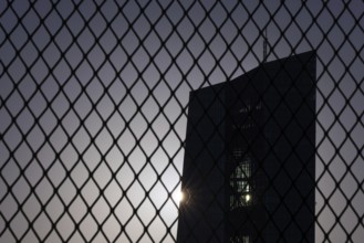 The sun passes behind the European Central Bank (ECB) in Frankfurt am Main, Frankfurt am Main,