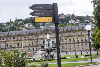 Digital signpost in front of the New Palace on Schlossplatz in Stuttgart. Regularly changing LED