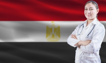Female doctor on Egypt flag. Doctor with crossed arms on Egypt flag. Egypt health and care concept
