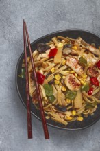 Fried noodles with chicken meat and vegetables, Bami Goreng, Indonesian dish, no people