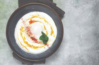 ?ilbir, traditional Turkish breakfast, Turkish eggs with yogurt and butter, homemade, no people