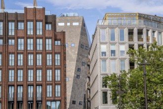 The Grote Markt in the old town of Groningen, modern facades of hotel and commercial buildings, in