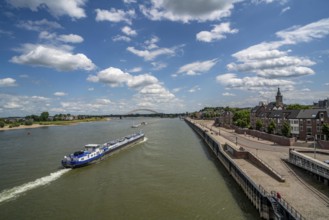 Cargo ship on the River Waal near Nijmegen, Netherlands