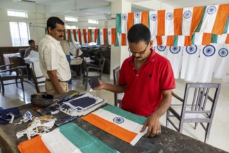 Employees of the Assam Khadi and Village Industries Board working in a manufacturing unit of Indian
