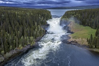 Aerial view over the Tännforsen falls in spring near Åre on the Indalsälven River, Sweden's largest