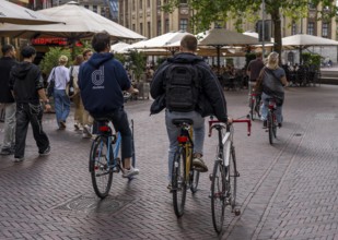Bicycle traffic in Groningen, second bicycle carried, Netherlands