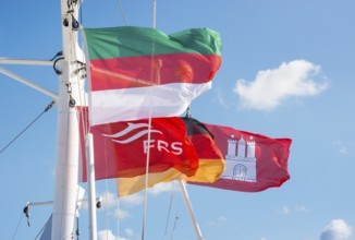 Flag of Heligoland, flag of the shipping company FRS, German flag and Hamburg state flag, flags,
