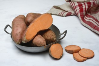 Sweet potato and sweet potato slices with skin, Ipomoea batatas